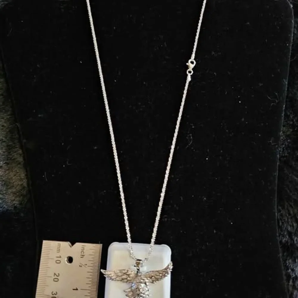 .75CTW VVSD Moissanite Eagle pendant in 925 sterling silver on 20